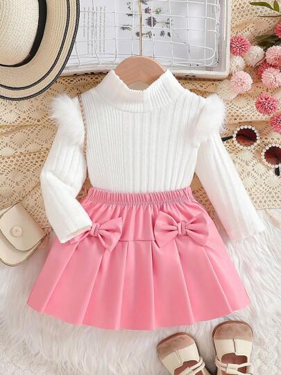 مجموعة لطفلة: تي شيرت بأكمام طويلة ذو ياقة عالية بسيط + تنورة مكسرة مزينة بفيونكة ، مناسبة للخروجات