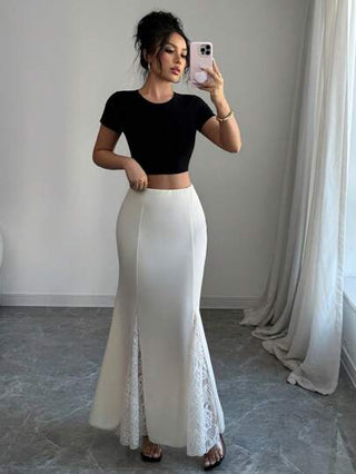Modelyn تنورة قلم أنيقة للسيدات ذات لون قاتم لون بتأثير الحرير مزينة بترقيع الشريط ومذيل بشكل ذيل سمكة