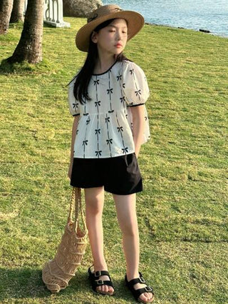 girls-sets DAZY مجموعة فتاة مراهقة تتكون من ملابس علوية ذو أكمام منفوخة مطبوع بشريط الأقواس وشورت 2 قطعة