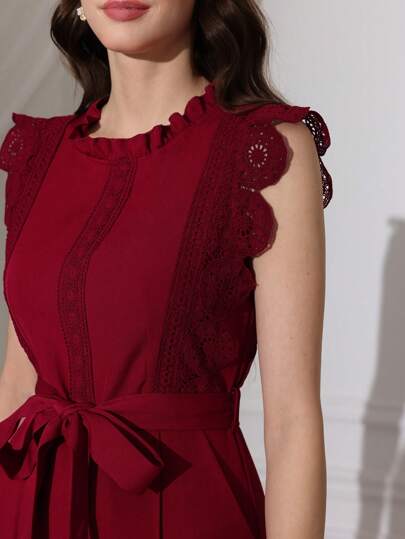 Modelyn العيد جمبسوت نسائية بلون أحادي مع دانتيل لامع أكمام بدون أكمام ، خصر مربوط بعقال ، رجل مستقيم