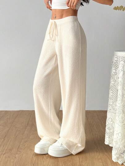 SHEIN EZwear سراويل نسائية بقصة فضفاضة وساق واسعة ذات لون أحادي للاستخدام اليومي