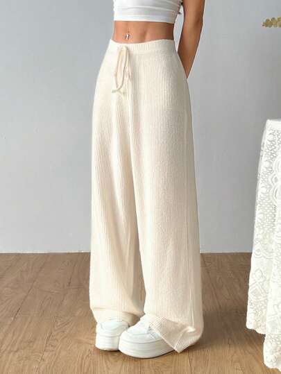 SHEIN EZwear سراويل نسائية بقصة فضفاضة وساق واسعة ذات لون أحادي للاستخدام اليومي