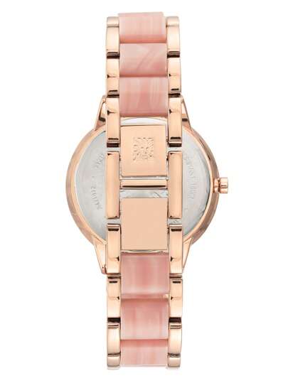 Anne Klein ساعة الأنيقة للنساء ذات الإطار الوردي الذهبي والإسورة القابلة للتعديل من الراتنج الوردي والقرص الأم اللؤلؤي الوردي الفاتح الدائري التناظري مقاومة للماء، موديل AK/1412PKRG