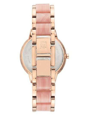 Anne Klein ساعة الأنيقة للنساء ذات الإطار الوردي الذهبي والإسورة القابلة للتعديل من الراتنج الوردي والقرص الأم اللؤلؤي الوردي الفاتح الدائري التناظري مقاومة للماء، موديل AK/1412PKRG