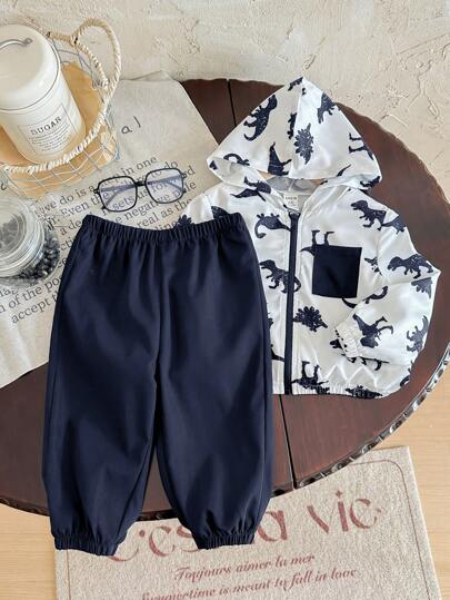 SHEIN طقم جاكيت برأس ذات طباعة ديناصور كرتوني وألوان متباينة وبنطلون أحادي اللون مناسب للأطفال الرضع والصغار، مناسب للربيع والصيف والخريف للسفر والخارج، قطعتان