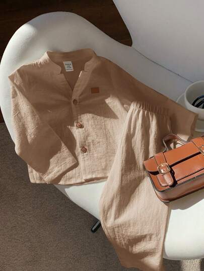 SHEIN طقم 2 قطعة تيشيرت أزرار طوق طويل الأكمام وبنطال خصر مطّاط كاجوال مناسب للأطفال الصغار الأولاد و البنات، مناسب لحفلات أعياد الميلاد وأعياد السنة الجديدة وحفلات المساء والمناسبات وحفلات الزفاف والمنشأسري والتعميد وحفلات عيد ميلاد الطفل الأول، حفلات اس