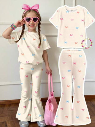 girls-sets مجموعة من قطعتين لفتيات المراهقات متكونة من بلوزة كاجوال بتصميم فضفاض وقصة بأكمام قصيرة مزينة برسومات أقواس ملونة ، وبنطلون بقصة مرفرفة ، للصيف