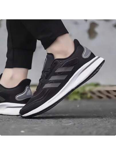 Adidas أحذية رياضية للجري سهلة الارتداء مريحة وقوية ذات رباط، ماصة للصدمات ومانعة للانزلاق