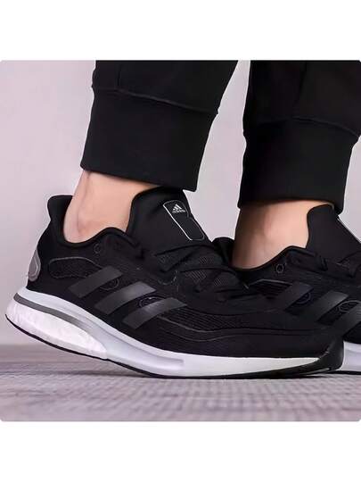 Adidas أحذية رياضية للجري سهلة الارتداء مريحة وقوية ذات رباط، ماصة للصدمات ومانعة للانزلاق