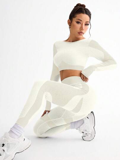SHEIN Sport Studio طقم ملابس رياضة نسائية بسترة بأربطة متقاطعة من الأكمام الطويلة وبنطال