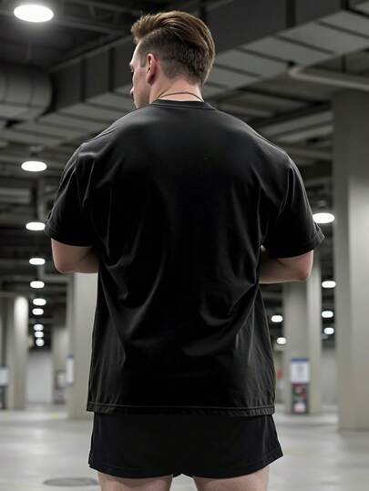Manfinity Sport Corelite تي شيرت رياضي كريو نيك أكمام قصيرة للرجال مطبوع عليه أثقال وأحرف، ملابس رياضية مريحة ومنفذة للهواء ومقاومة للرطوبة