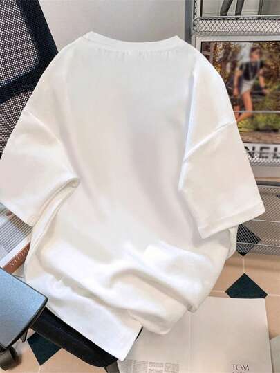 EZwear تي شيرت ياقة مستديرة أكبر من المقاس بأكم قصير، ألوان مبهجة وبطباعة شعارات بسيطة، قطعة صيفية جديدة للنساء بعناصر أوقيانوسية وبحرية