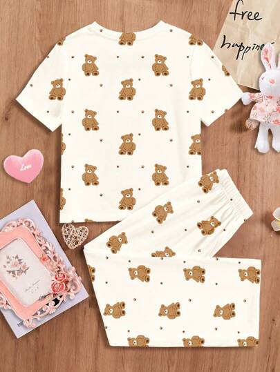 SHEIN طقم بيت نسائي مكون من بلوزة كاجوال بأكمام قصيرة ذات تصميم ضيق مع رسمة الدبدوب الجميل و بنطال فضفاض طويل، مناسب لفصلي الربيع والصيف