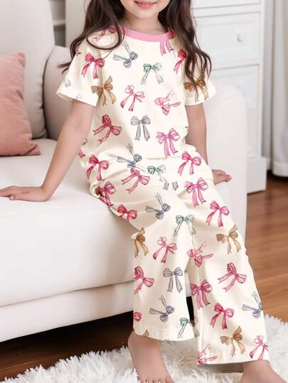 SHEIN Leap Crew طقم ملابس غير رسمي من تي شيرت تيشيرت بأكمام قصيرة وياقة مستديرة، وبنطال فضفاض للفتيات المراهقات في فصلي الربيع والصيف مع تصميم فراشة