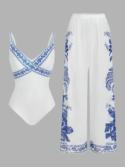 SHEIN Swim Oasis مجموعة قطعتين بنقشة زهرية، بدلة سباحة قطعة واحدة بياقة على شكل حرف V وبنطال ساق واسع للارتداء فوقها في عطلة الشاطئ