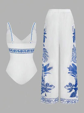 SHEIN Swim Oasis مجموعة قطعتين بنقشة زهرية، بدلة سباحة قطعة واحدة بياقة على شكل حرف V وبنطال ساق واسع للارتداء فوقها في عطلة الشاطئ