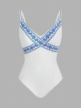 SHEIN Swim Oasis مجموعة قطعتين بنقشة زهرية، بدلة سباحة قطعة واحدة بياقة على شكل حرف V وبنطال ساق واسع للارتداء فوقها في عطلة الشاطئ