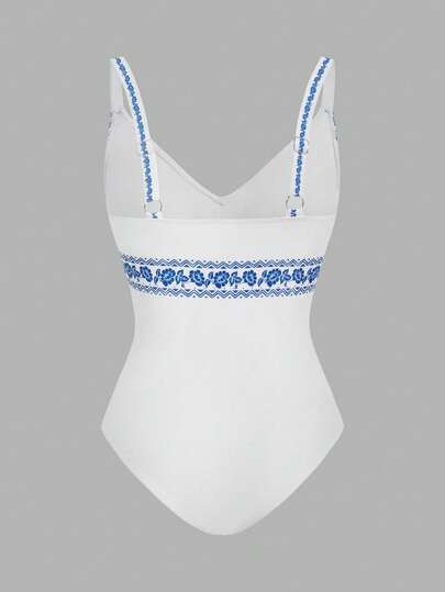 SHEIN Swim Oasis مجموعة قطعتين بنقشة زهرية، بدلة سباحة قطعة واحدة بياقة على شكل حرف V وبنطال ساق واسع للارتداء فوقها في عطلة الشاطئ