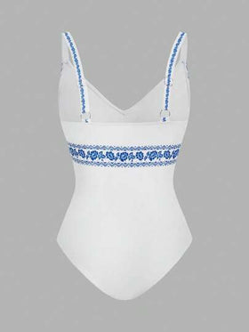 SHEIN Swim Oasis مجموعة قطعتين بنقشة زهرية، بدلة سباحة قطعة واحدة بياقة على شكل حرف V وبنطال ساق واسع للارتداء فوقها في عطلة الشاطئ