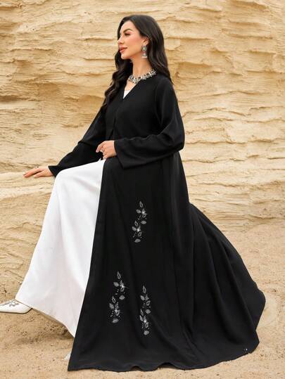 Al Najma عباية سوداء فضفاضة أنيقة مطرزة للنساء، تصميم محتشم
