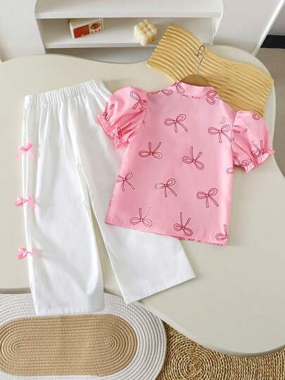 SHEIN Genkimix Kids مجموعة من 2 قطعة تتألف من قميص بأكمام منتفخة مطبوع عليه فراشات وبنطلون طويل مزين بفيونكة لفتاة صيف عادي