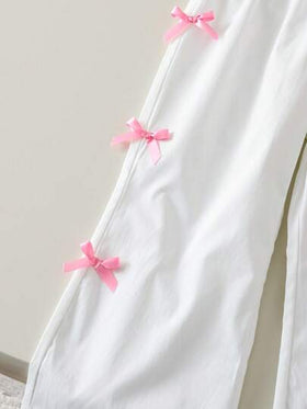 SHEIN Genkimix Kids مجموعة من 2 قطعة تتألف من قميص بأكمام منتفخة مطبوع عليه فراشات وبنطلون طويل مزين بفيونكة لفتاة صيف عادي