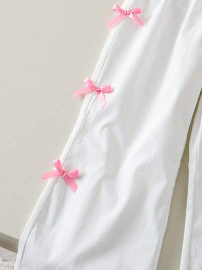 SHEIN Genkimix Kids مجموعة من 2 قطعة تتألف من قميص بأكمام منتفخة مطبوع عليه فراشات وبنطلون طويل مزين بفيونكة لفتاة صيف عادي