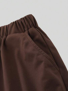 SHEIN سروال قصير رخو للمراهقين الأولاد خفيف بطباعة حرفي بسيط