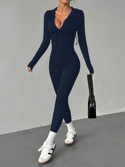 Flirla جمبسوت طويلة الأكمام بغطاء رأس وسحاب أمامي ، لون أحادي للنساء
