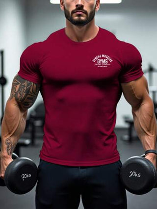 Manfinity Sport Corelite تي شيرت رجالي بياقة دائرية مطبوع عليه حروف، كاجوال وملائم للياقة البدنية والتمارين الرياضية، أكمام قصيرة