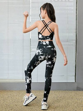 SHEIN مجموعة رياضية من الأعلى القصير بتصميم متقاطع الظهر والسراويل الضيقة الخصر العالي للفتيات المراهقات، مصنوعة من القماش المنسوج القابل للإسترخاء والصباغة، مناسبة للرياضة وملائمة للعودة للمدرسة
