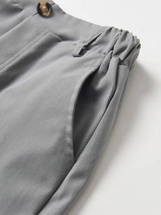 SHEIN بنطلون صبي كاجوال أحادي اللون ، زخرفة بزر واحد ، جيب مائل ، تصميم خصر مرن ، مريح للارتداء اليومي ، للسفر ، الحفلات ، المهرجانات ، متعدد الاستخدامات وأنيق