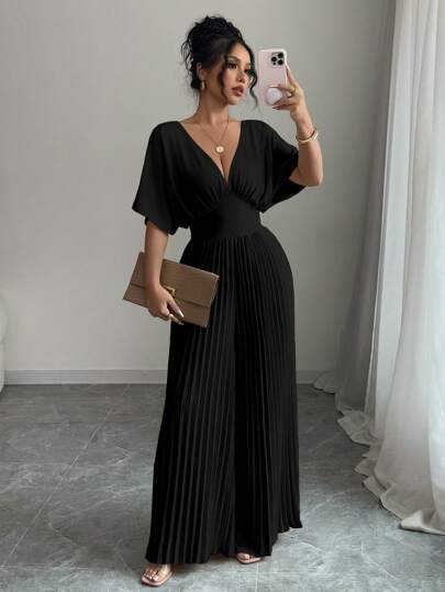 Elenzga جمبسوت نسائية أنيقة بلون قاتم، بياقة على شكل V عميق، أكمام على شكل الخفاش، وتصميم منسدل للخصر