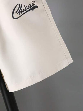 مجموعة قميص رياضي مطبوع بطباعة شيكاغو و شورت بلون سادة للأولاد , صيفي