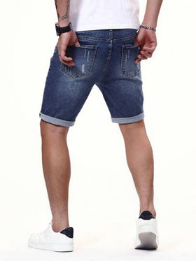 Manfinity Homme شورت جينز رجالي ممزق برسمة حافة مطوية من الأسفل باللون الأزرق الداكن، مناسب للعطلات وللأصدقاء العزيزين