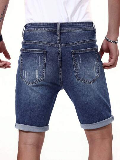 Manfinity Homme شورت جينز رجالي ممزق برسمة حافة مطوية من الأسفل باللون الأزرق الداكن، مناسب للعطلات وللأصدقاء العزيزين