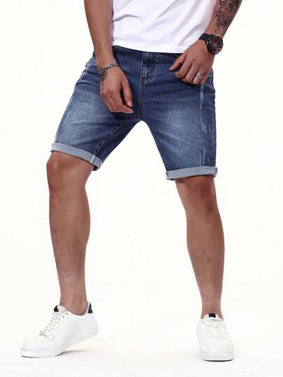 Manfinity Homme شورت جينز رجالي ممزق برسمة حافة مطوية من الأسفل باللون الأزرق الداكن، مناسب للعطلات وللأصدقاء العزيزين