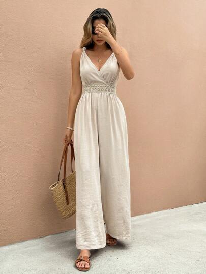 SHEIN Frenchy بدلة قطعة واحدة نسائية بفتحة على شكل حرف V في الرقبة بدون أكمام ذات ساق واسعة للعطلة