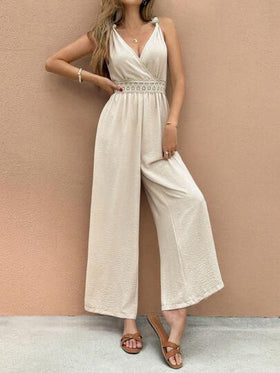 SHEIN Frenchy بدلة قطعة واحدة نسائية بفتحة على شكل حرف V في الرقبة بدون أكمام ذات ساق واسعة للعطلة