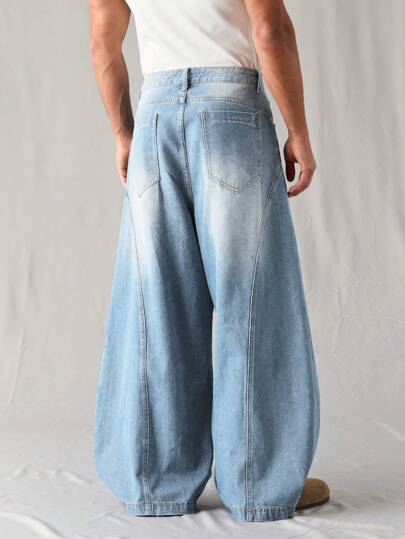 Manfinity Denimwave جينز رجالي فضفاض بقصة برميل أزرق متوسط مغسول، جينز رجالي فضفاض، جينز يونيسكس مغسول بنمط القمر مشوه
