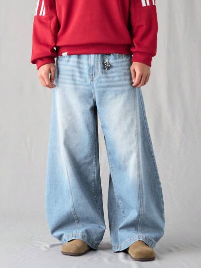 Manfinity Denimwave جينز رجالي فضفاض بقصة برميل أزرق متوسط مغسول، جينز رجالي فضفاض، جينز يونيسكس مغسول بنمط القمر مشوه