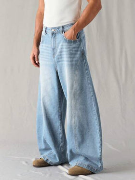Manfinity Denimwave جينز رجالي فضفاض بقصة برميل أزرق متوسط مغسول، جينز رجالي فضفاض، جينز يونيسكس مغسول بنمط القمر مشوه