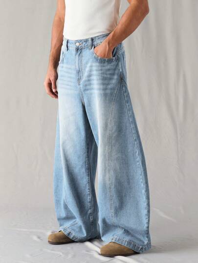Manfinity Denimwave جينز رجالي فضفاض بقصة برميل أزرق متوسط مغسول، جينز رجالي فضفاض، جينز يونيسكس مغسول بنمط القمر مشوه