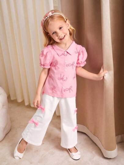SHEIN Genkimix Kids مجموعة من 2 قطعة تتألف من قميص بأكمام منتفخة مطبوع عليه فراشات وبنطلون طويل مزين بفيونكة لفتاة صيف عادي