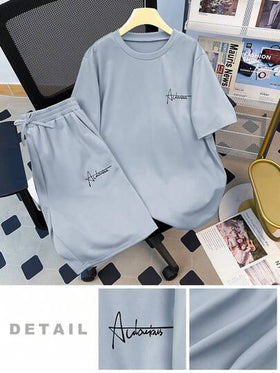 SHEIN طقم بلوزة كاجوال 2 قطعة بتصميم مطبوع بحروف للمراهقين والشباب والرجال، تي شيرت قصير الأكمام وسروال، بتصميم عصري هادئ للأوقات الحر