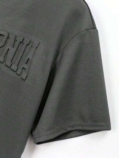 SHEIN قمصان كاجوال باكتاف ساقطة بأكمام قصيرة مع نص إنجليزي مُنقوش للمراهقين الصبية