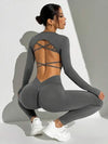 SHEIN Sport Studio مجموعة قطعتين كاجوال من قميص T مناسق مع أكمام طويلة وياقة مستديرة وقصير للنساء، وسروال ضيق