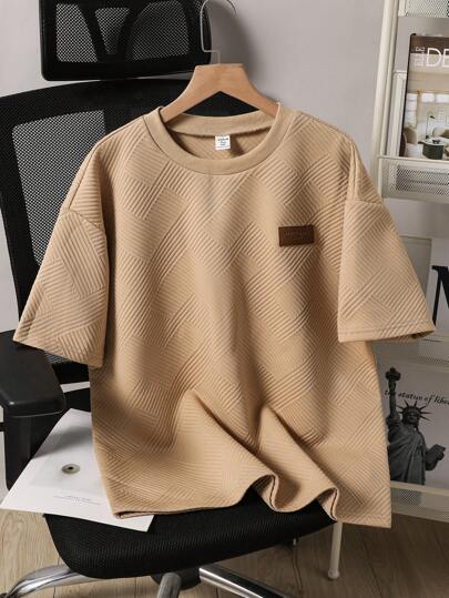 SHEIN تي شيرت كاجوال واسع السترة قصير الأكمام بياقة دائرية بتصميم حرفي للمراهقين