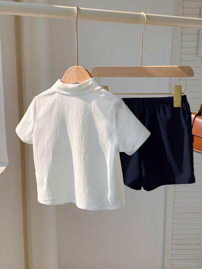 SHEIN مجموعة قميص طباعة الحصان وشورت ذو خصر مطاطي للأولاد الرضع، باللونين الأسود والأبيض، مناسبة لحفلات عيد الميلاد والمعمودية وعيد الميلاد الأول والمناسبات الرسمية والعروض والزفاف