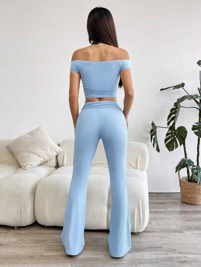 EZwear مجموعة ب- 2 قطعة للنساء، توب قصير بأكمام قصيرة وكتف متساقط وبنطلون ساق واسعة، بلون صلب